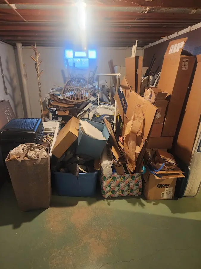 Roll-off dumpster container at job site for Cleanout Dumpster Rental in Choccolocco